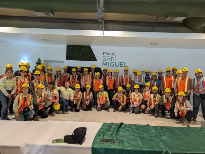group photo, people with helmets and high-viz vests